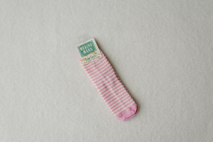 Soft pink and white stripe merino wool baby socks. made in new zealand