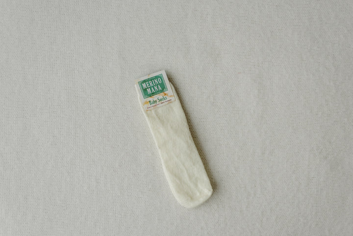 off white merino wool baby socks. made in new zealand