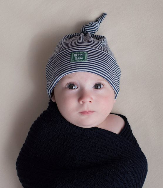 Navy blue merino wool baby blanket and hat set. made in new zealand.