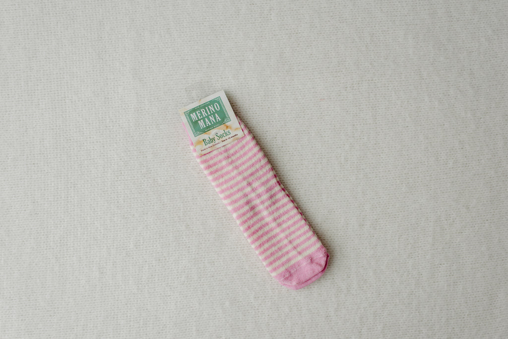 Soft pink and white stripe merino wool baby socks. made in new zealand
