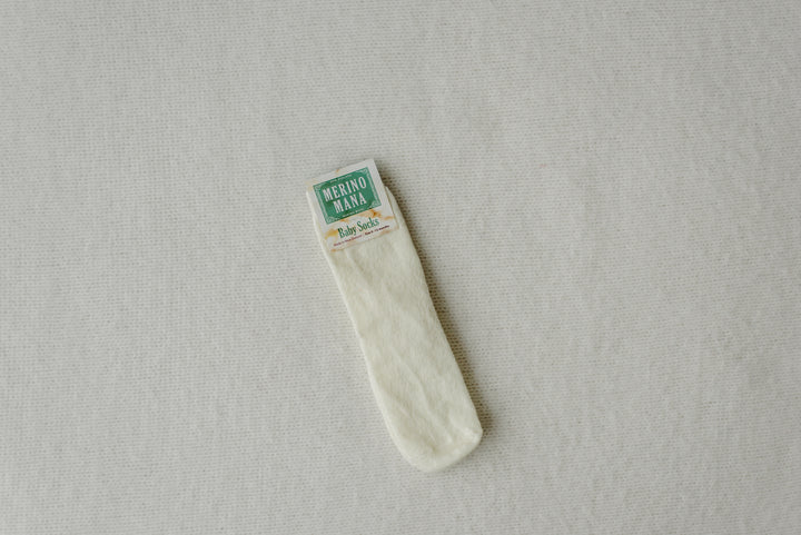 off white merino wool baby socks. made in new zealand 